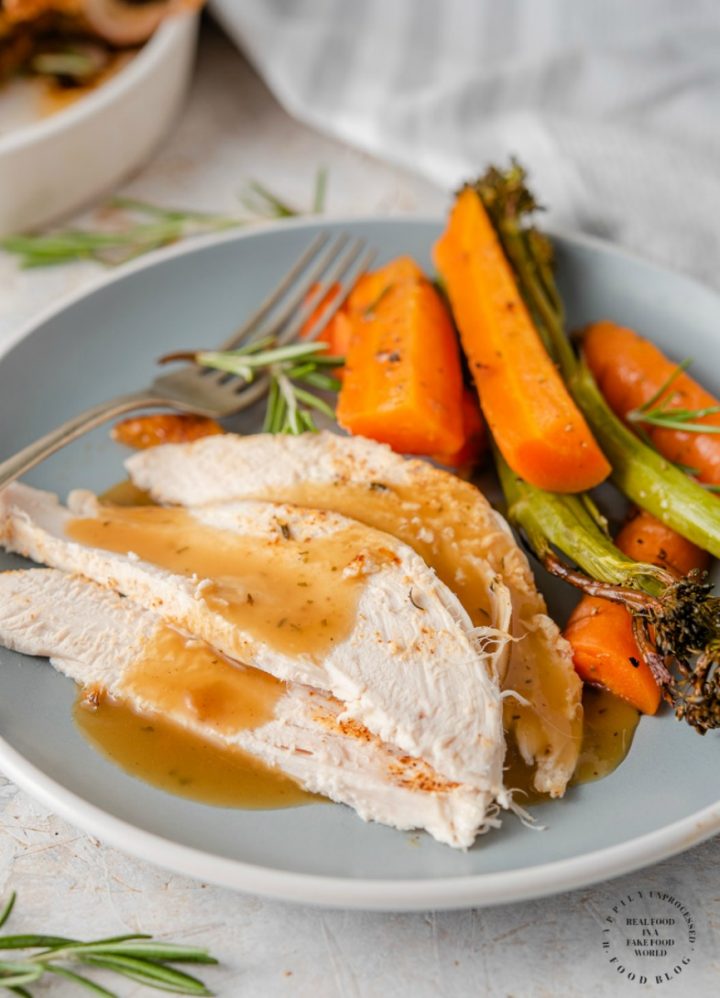 GARLIC HERB ROASTED CHICKEN - Delicious moist chicken roasted in the oven with homemade gravy #chicken #roasted #keto #lowcarb #happilyunprocessed