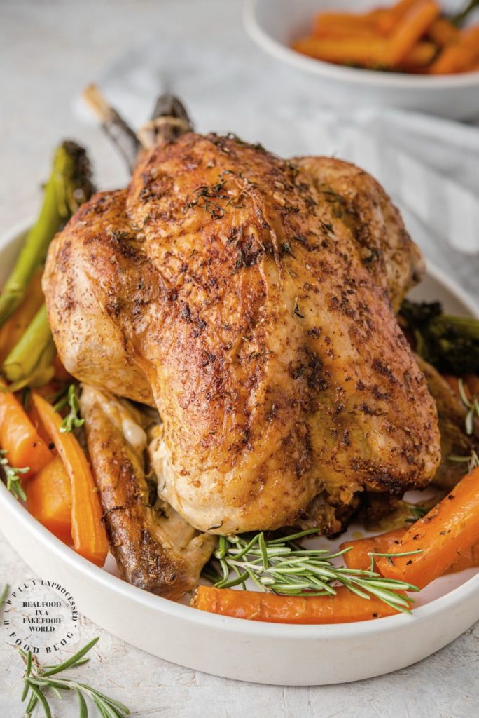 GARLIC HERB CHICKEN - oven roasted chicken with garlic herb butter makes the best gravy #ovenroasted #roastedchicken #chicken #easy #dinner #lowcarb #keto #happilyunprocessed