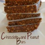 stacked chocolate peanut butter lara bars between wax paper