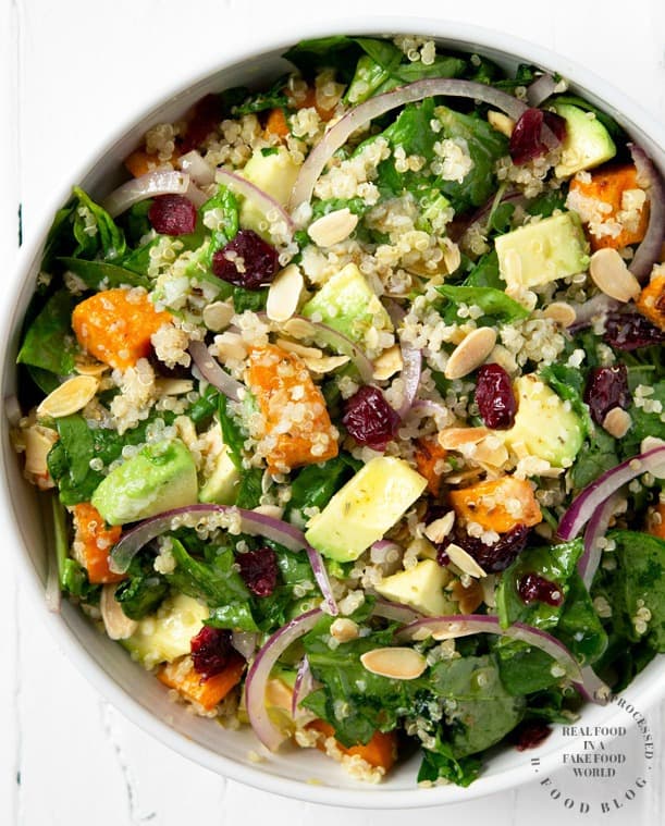 bowl of roasted sweet potato, spinach & quinoa salad