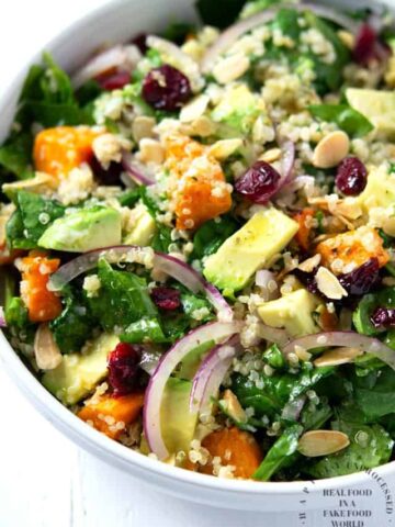 bowl of roasted sweet potato, spinach & quinoa salad