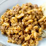 CHEESY HAMBURGER SKILLET Ground beef, spices, tomato sauce, pasta a cheese in one skillet #hamburgerhelper #dinner #beef #happilyunprocessed.com