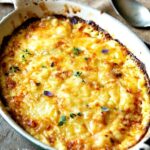 ROASTED GARLIC & CARAMELIZED ONION POTATOES DAUPINOISE - cheese potatoes au gratin but with roasted garlic and onions #potatoes #scalloped #sidedish #vegetarian #happilyunprocessed.com