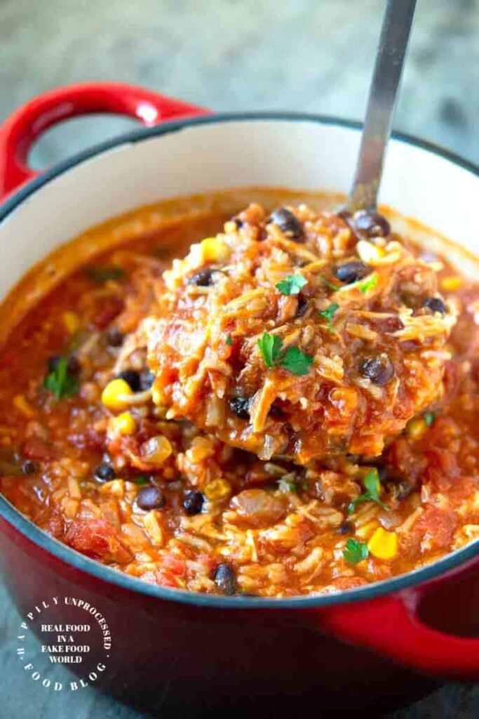 CHICKEN TORTILLA SOUP WITH RICE - perfect blend of Mexican spices, shredded chicken, corn, beans and rice for a filling bowl of soup #soup #chickentortilla #healthy #happilyunprocessed