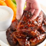 chicken wings baked with an epic dry rub and slathered with sweet & spicy homemade sauce #wings #football #happilyunprocessed