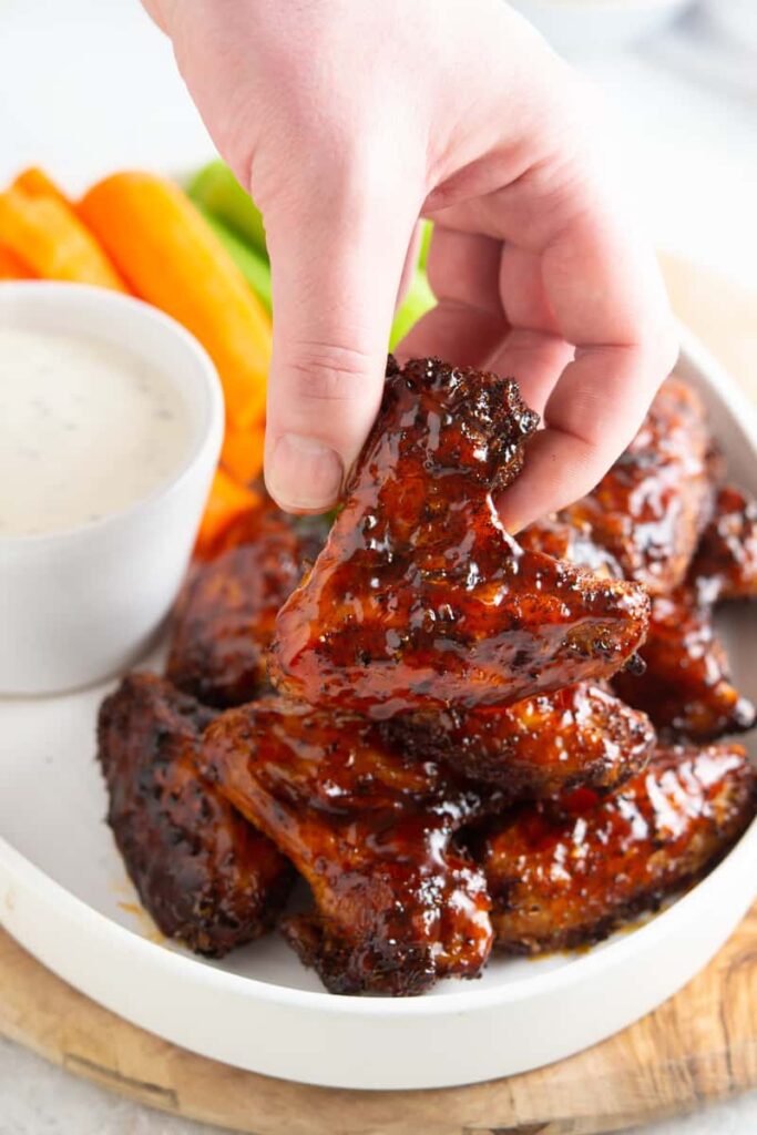 chicken wings baked with an epic dry rub and slathered with sweet & spicy homemade sauce #wings #football #happilyunprocessed