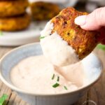 Roasted cauliflower fritters with a Bloomin Onion dipping sauce - roasting the cauliflower takes the water out as well as brings out that caramelized roasted flavor in these fritters #cauliflower #appetizer #vegetarian #happilyunprocessed