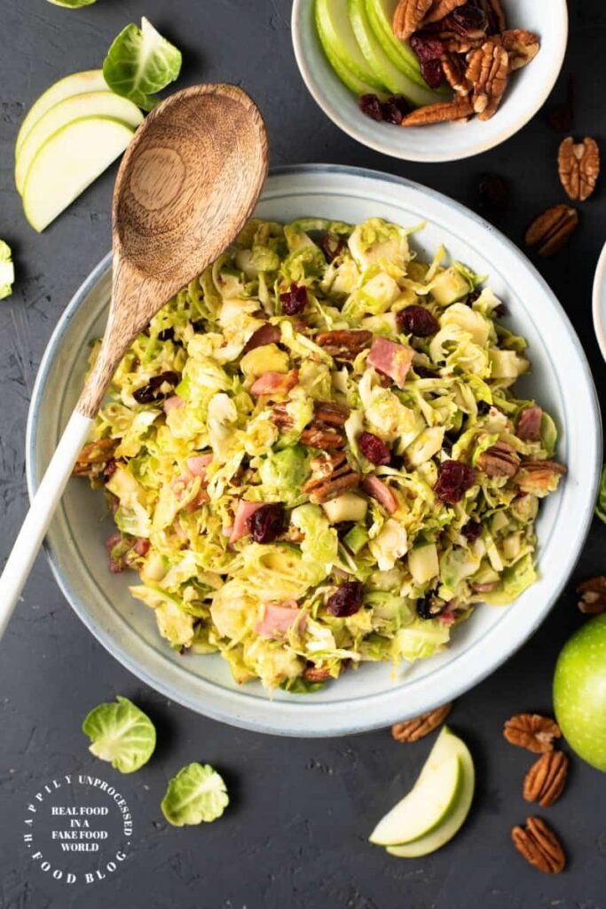 SHAVED BRUSSEL SPROUT SALAD w HONEY MUSTARD & APPLE VINAIGRETTE #brusselsprouts #salad #healthy #sidedish #happilyunprocessed.com