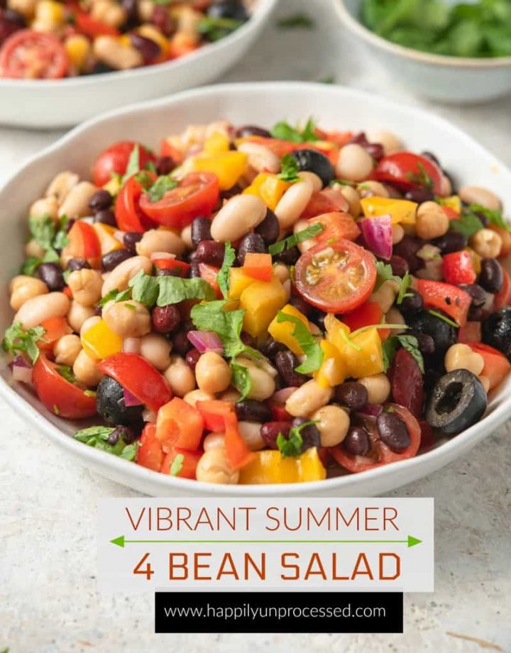 VIBRANT SUMMER 4 BEAN SALAD - 4 types of beans, colorful peppers, tomatoes, olives and red onion in a emulsified oil and vinegar dressing #summerrecipes #beansalad #potluck #healthy #summer #salads #happilyunprocessed