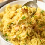 RICE PILAF WITH ORZO AND SLIVERED ALMONDS - No boxed rices! Homemade rice pilaf is the easiest side dish #rice #sidedish #orzo #happilyunprocessed