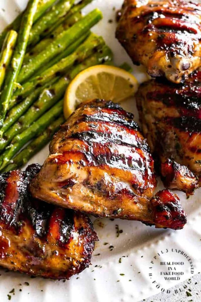 BBQ CHICKEN THIGHS - the most epic bbq'd chicken on the planet! #bbq #chicken #grill #bbqsauce #happilyunprocessed