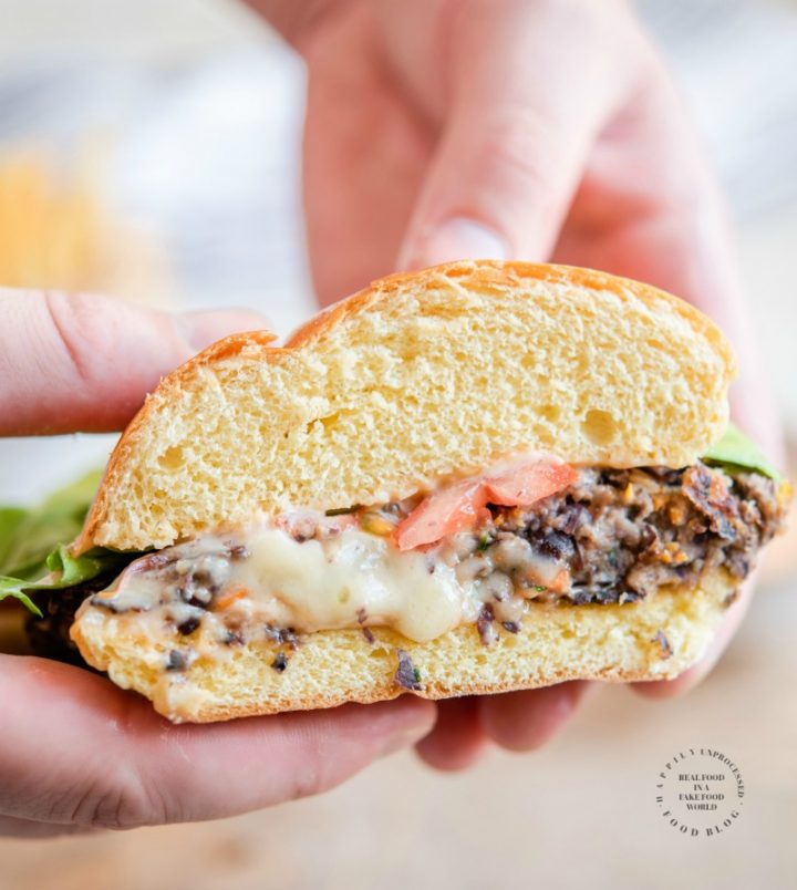 STUFFED BLACK BEAN BURGER with Monterey Jack Cheese - seasoned black beans, diced veggies, spices and cheese make up this delicious meat alternative burger #blackbeanburger #impossiblemeat #vegetarian #dinner #grill #happilyunprocessed