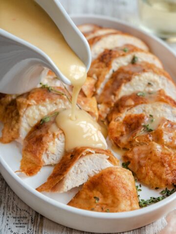 Turkey breast cooked in a crockpot results in the moistest breast meat due to the crockpots unique ability to baste as it cooks. #Thanksgiving #turkey #holida