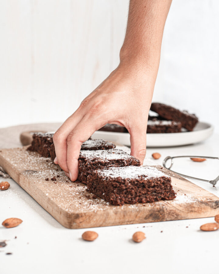 Healthy chocolate zucchini brownies with powdered sugar on top