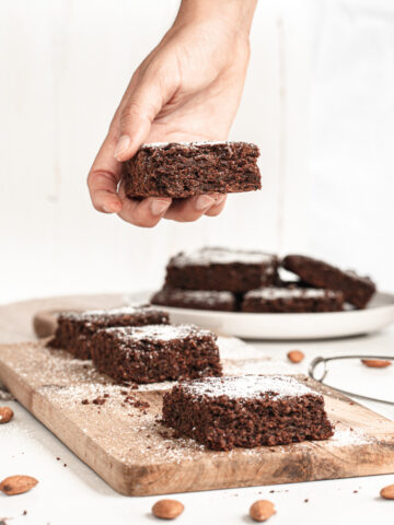 Healthy chocolate zucchini brownies with powdered sugar on top