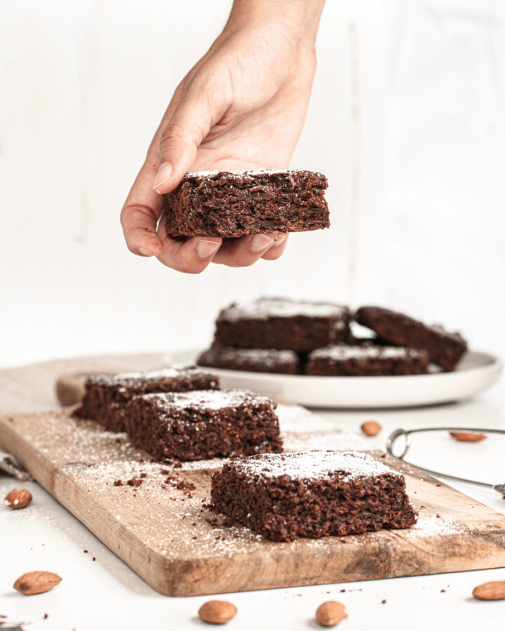 Healthy chocolate zucchini brownies with powdered sugar on top