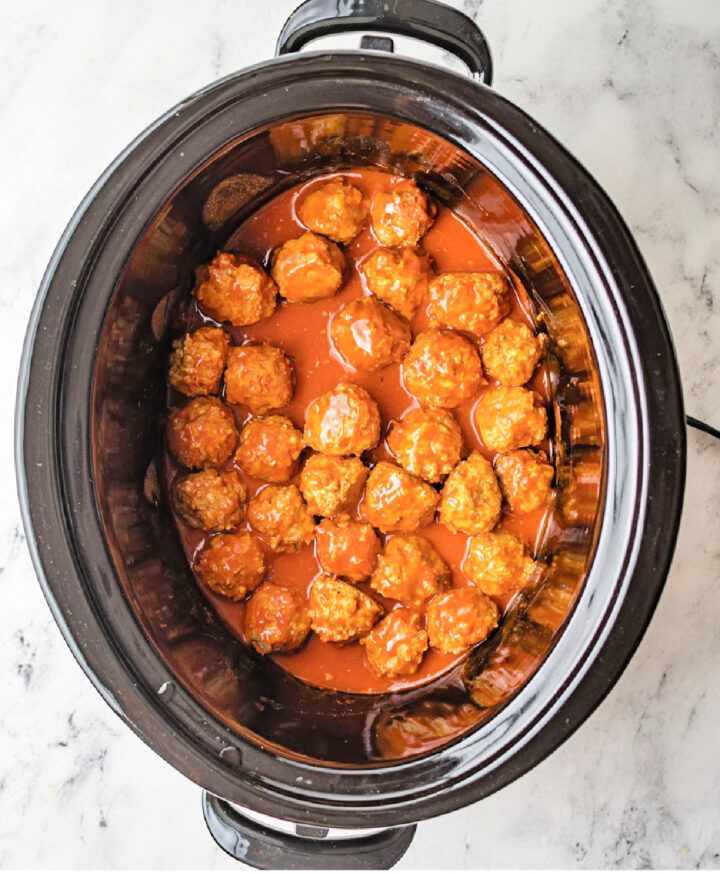 Stuffed chicken buffalo meatballs in a slow cooker