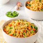Cauliflower rice in a white bowl is a healthy alternative to chinese rice