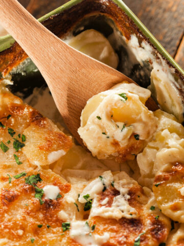 piping hot cheesy potatoes au gratin are the perfect side dish to any meal