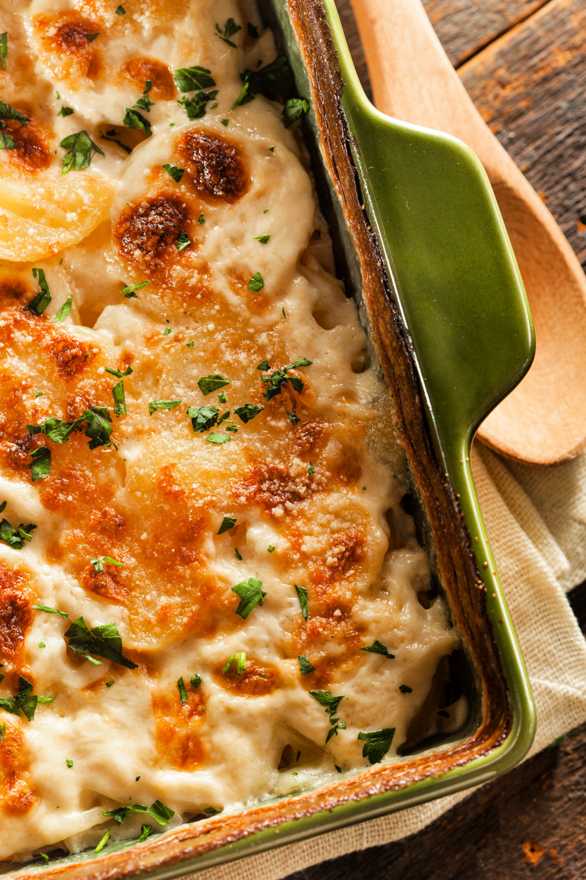 A tray of bubbling hot cheesy potatoes au gratin