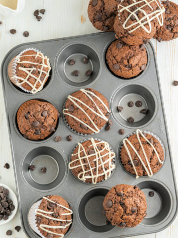 DOUBLE CHOCOLATE CHIP MUFFINS DRIZZLED WITH WHITE CHOCOLATE FEATURE