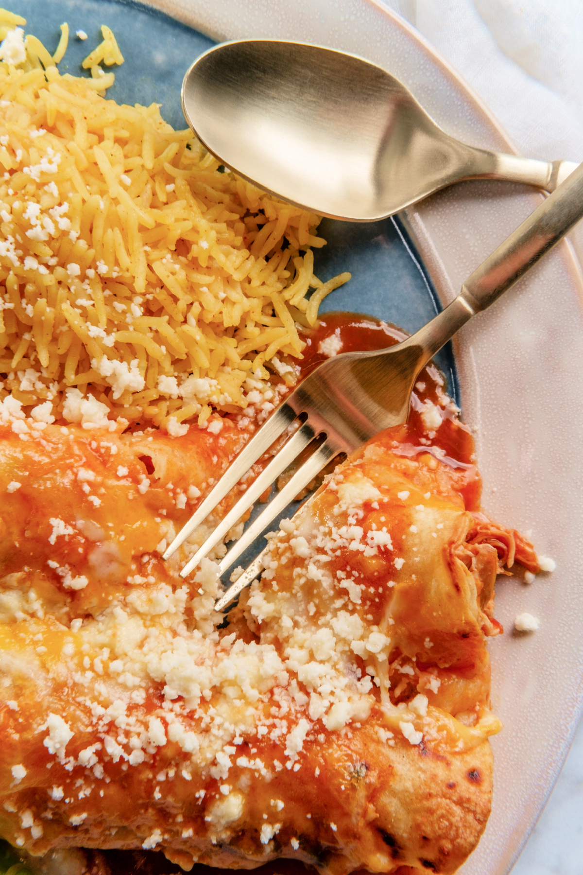 Traditional Mexican shredded chicken enchiladas dinner