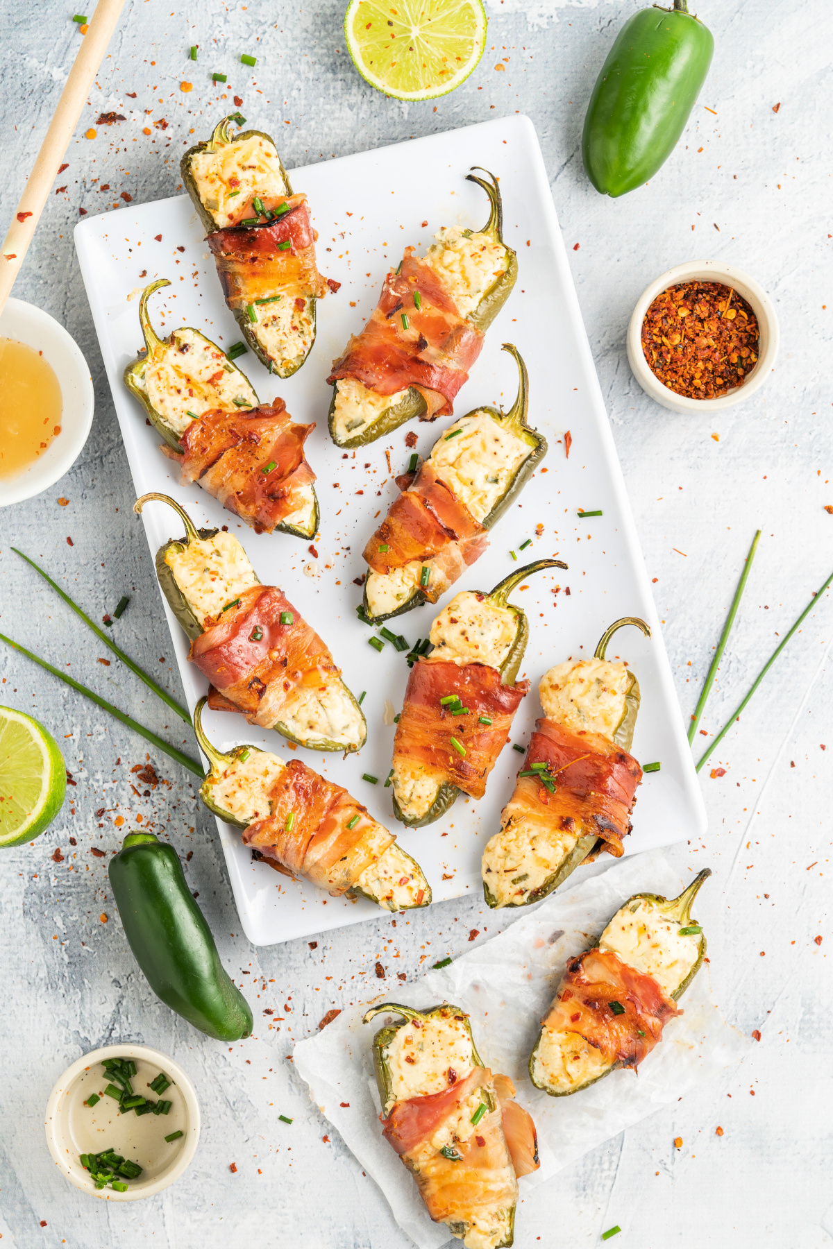 Bacon wrapped jalapeno poppers brushed with melted butter and honey and baked until golden
