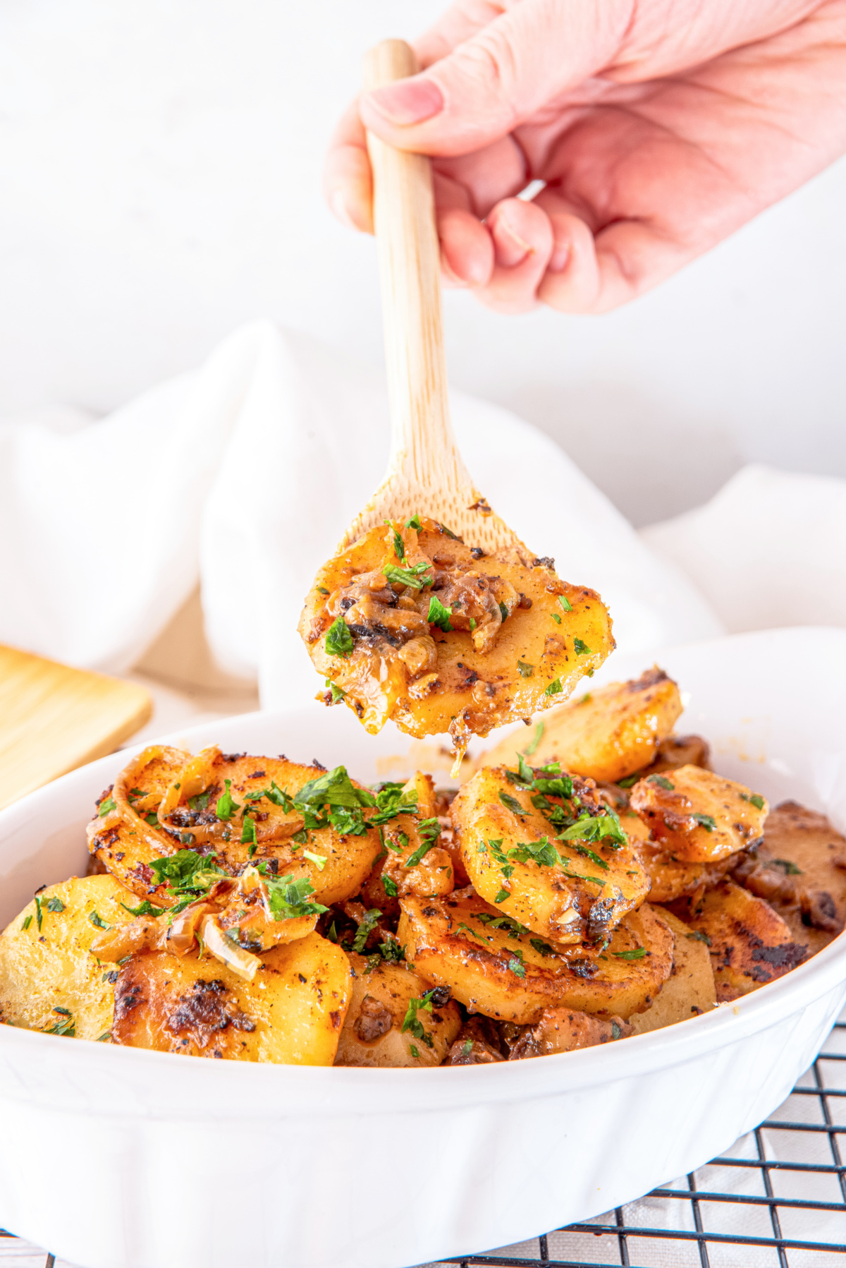smothered potatoes with sliced onions and garlic