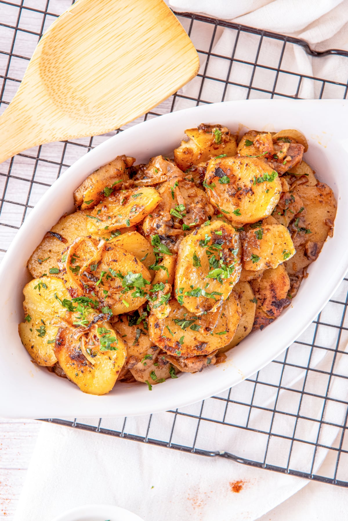 smothered potatoes in thinly sliced onions and garlic