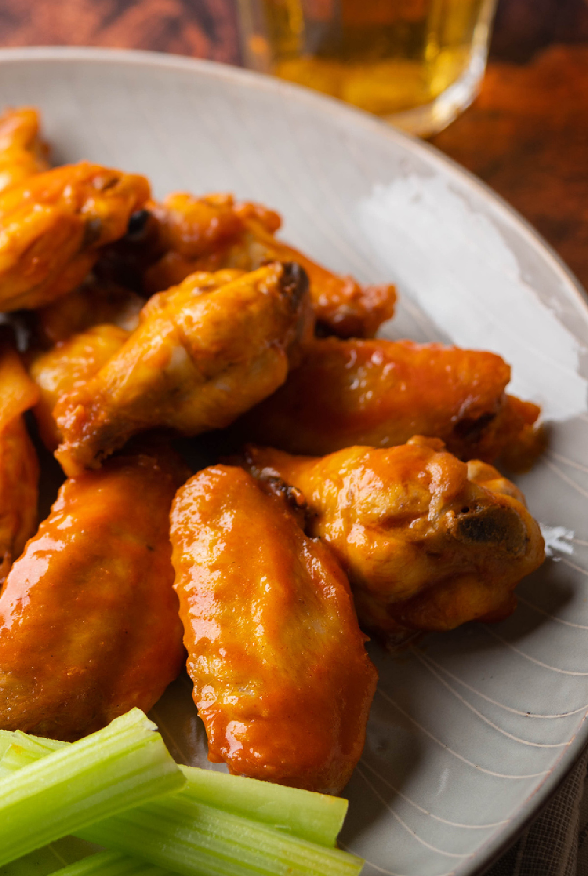 Copycat Buffalo wild wing sauces on top of crispy wings 
