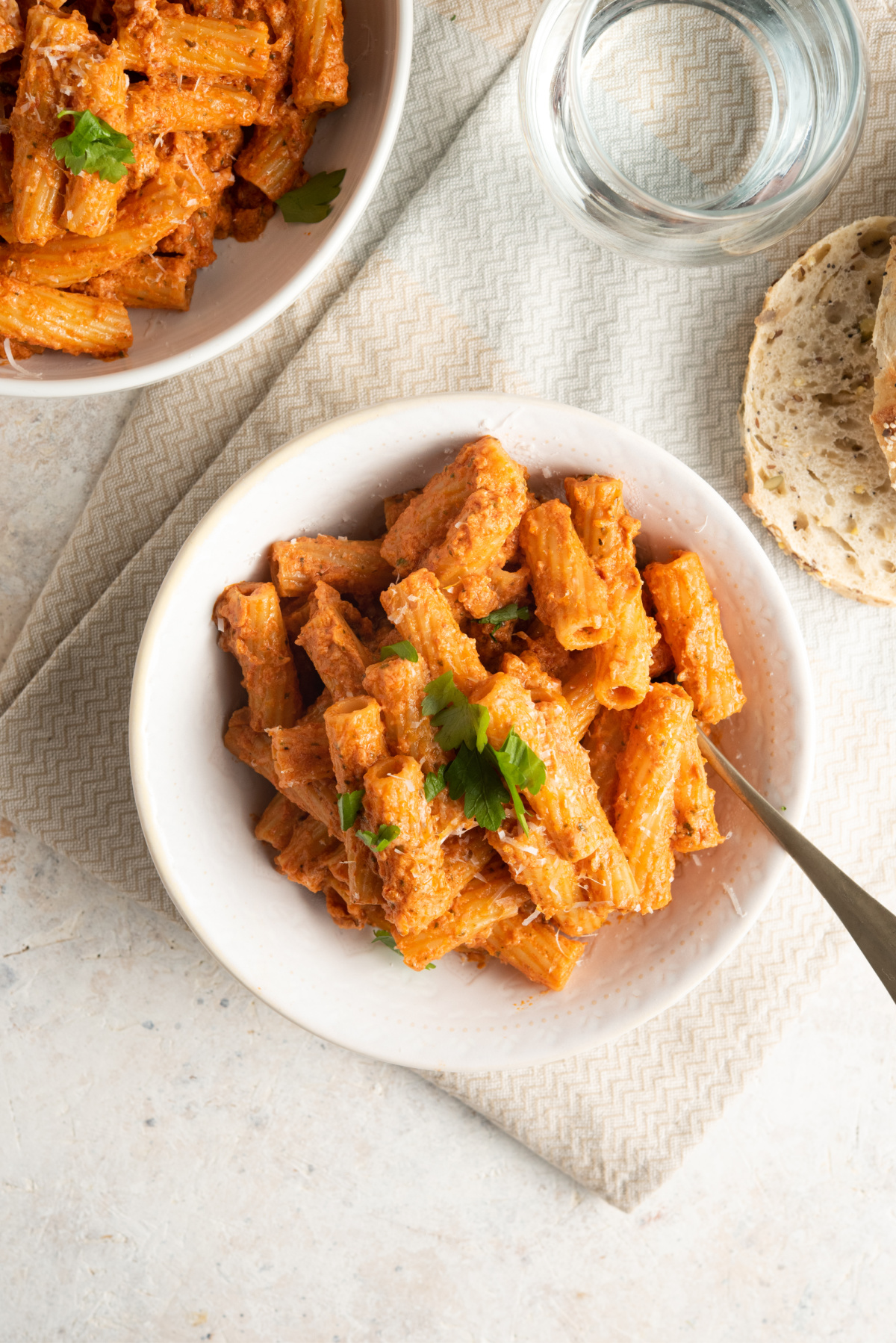 A bowl of rigatoni in sundried tomato and mascarpone sauce