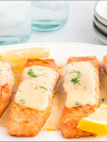 pan seared salmon in a creamy white wine and dill sauce