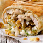 A turkey burrito made with leftover Thanksgiving turkey, stuffing, mashed potatoes and gravy