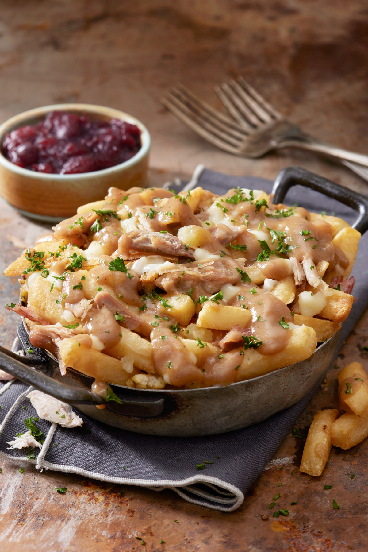 Poutine with leftover shredded Thanksgiving turkey, french fries, cheese and gravy