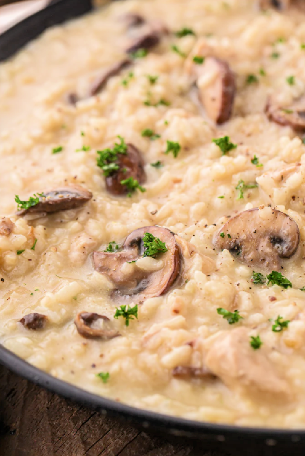 one skillet creamy mushroom risotto with chunks of chicken
