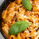 A delicious skillet of pan seared chicken and pasta in a cream sauce called Marry me chicken